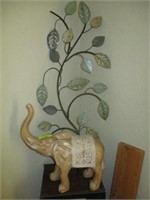 Elephant and metal flower wall decor