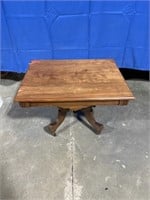 Wood end table on wheels, dimensions are 30 x 23