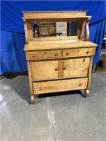 Wood dresser on wheels with mirror and hutch,
