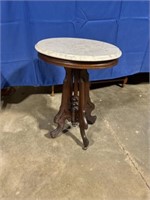 Marble topped oval end table with antique wooden