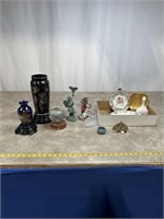 Oriental plates, glass horse statue, and vases