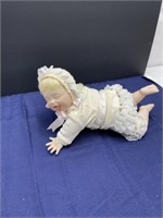 Crawling baby porcelain doll