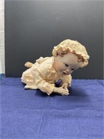 Crawling porcelain doll