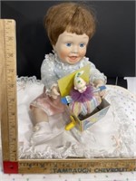 Porcelain doll with Jack-in-the-Box