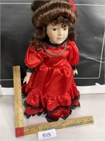 Porcelain doll red dress