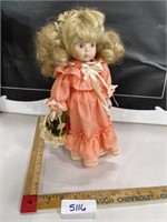 Porcelain doll peach dress with stand