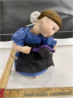 Amish porcelain doll head string is loose