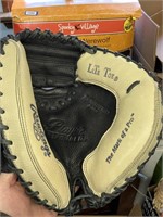 rawlings 0 shock left handed gloves excellent