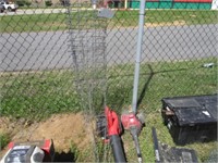 288) Weed trimmer, blower and tomato cages