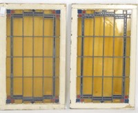 Pair of antique stained glass windows