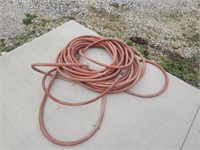 100' Heavy-duty garden hose.