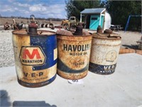 3 5 gal oil advertising cans.