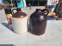 Two stone jugs.