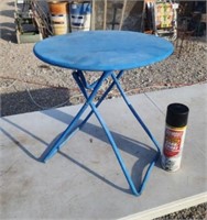 Steel folding patio stand.