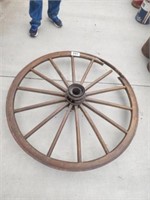 55"  old wood wagon wheel part of the wood is