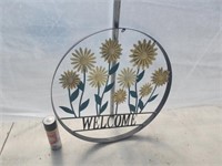 Metal flower welcome sign.