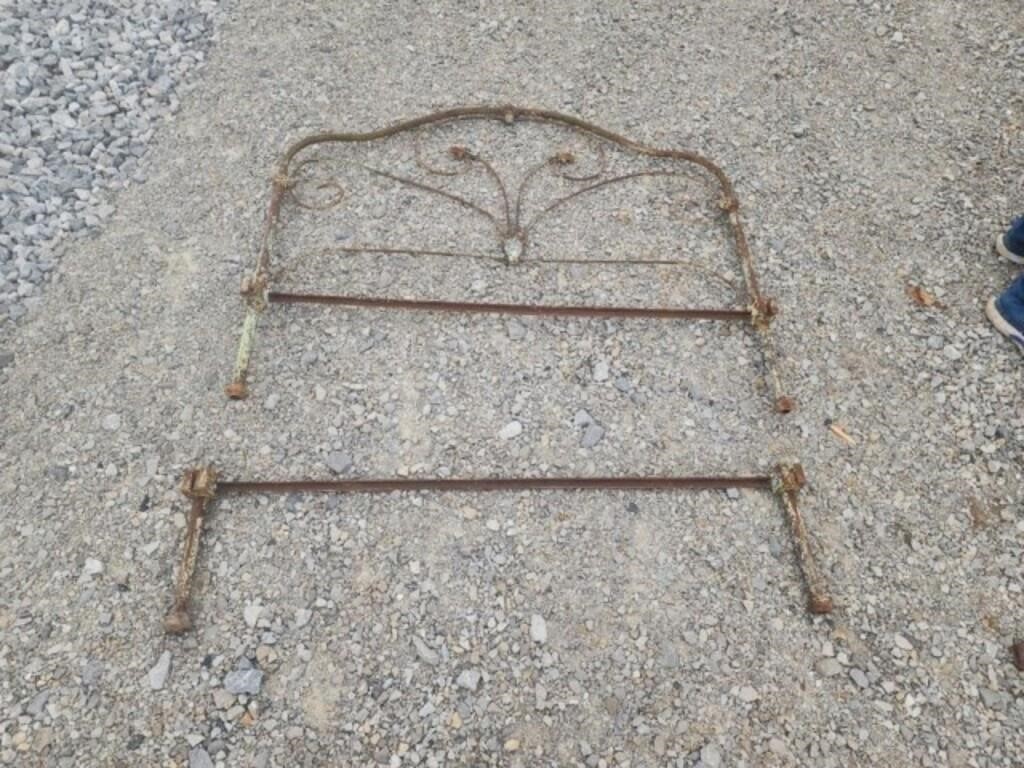 Old iron bed no rails.