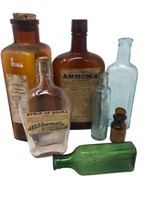 Older colored medicine pharmacy glass bottles