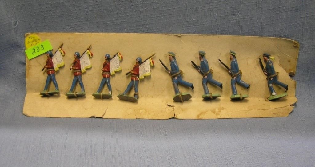 Eight piece antique hand painted toy soldier set