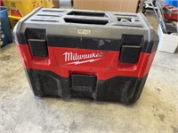 Milwaukee, battery operated vacuum.  Works with