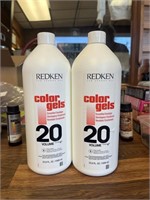 Bottles of hair Color Gells & developer Redken