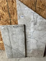 2 slabs of white marble