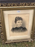 Picture of lady in gold frame