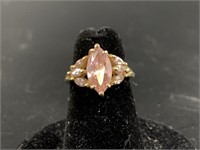 14kt Gold and pink topaz ring, size 5 1/2, a littl