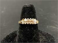 14kt Gold and diamond ring, size 7, front is 2 row