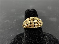 10kt Gold ring, with a faceted gold face, size 7,