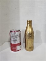 vintage gold metal coke bottle