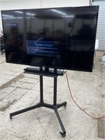 Samsung 55" TV on Rolling Stand (powers on)