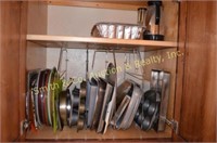 CONTENTS OF CABINET - BAKING SHEETS, MUFFIN TINS,