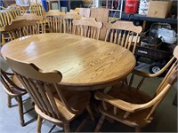 5’ Dinning Table, 2 Captain & 9 chairs, 4 leaves