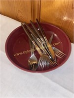 Mid century wood handle flatware in pottery pie