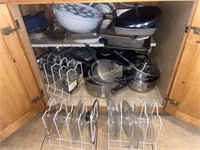 Cookware and glass lids in bottom cabinet