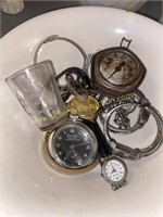 Pocket watch, gauge, medicine cup and wrist