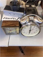 Alarm clocks, cameras and transistor radio