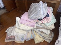 Large group of vintage bed linens and more