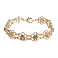 1928 Gold Tone 7 Crystal Flower Link Bracelet