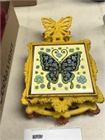 VTG. CAST IRON BUTTERLY TRIVET AND FOOD WARMER