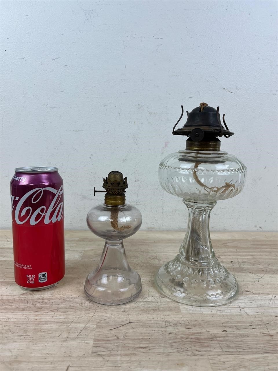 Two antique oil lamps