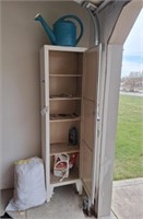 Wood Narrow Cabinet, Lawn Chairs, Watering Can