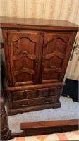 6 drawer wooden armoire. 19”x39”x60” contents not