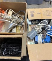 Three boxes of electrical and pegboard hooks