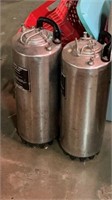 Two metal stainless canisters