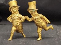 Bronze figurine of 2 Victorian boy on top hats.