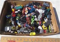 Box of small toy cars, trucks, misc.