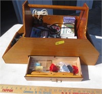 Wooden tote with model airplane items