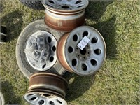 678) P 265/70R17 tire & 4 GMC wheels & caps